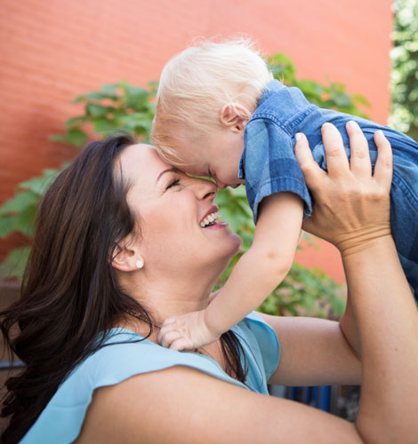 Aimee Raupp holding toddler